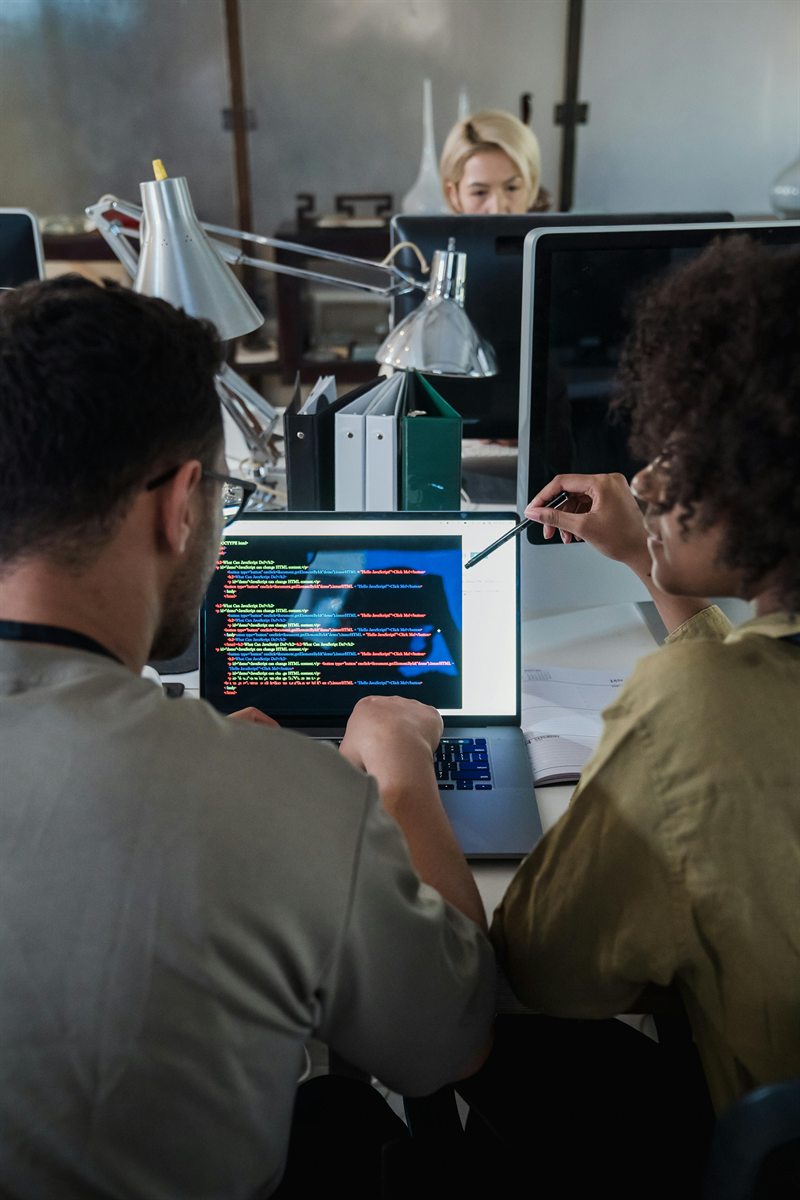 Professional software team working on a technology product